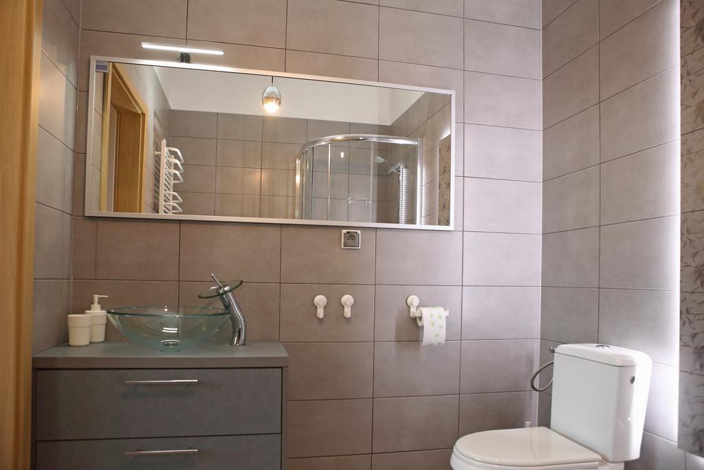 Apartamenty W Sercu Chelmna Chełmno Szoba fotó