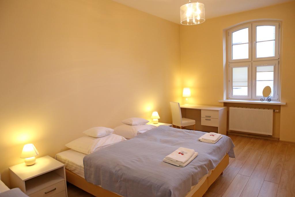 Apartamenty W Sercu Chelmna Chełmno Szoba fotó