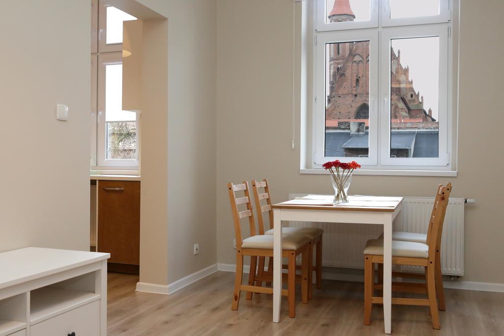 Apartamenty W Sercu Chelmna Chełmno Szoba fotó