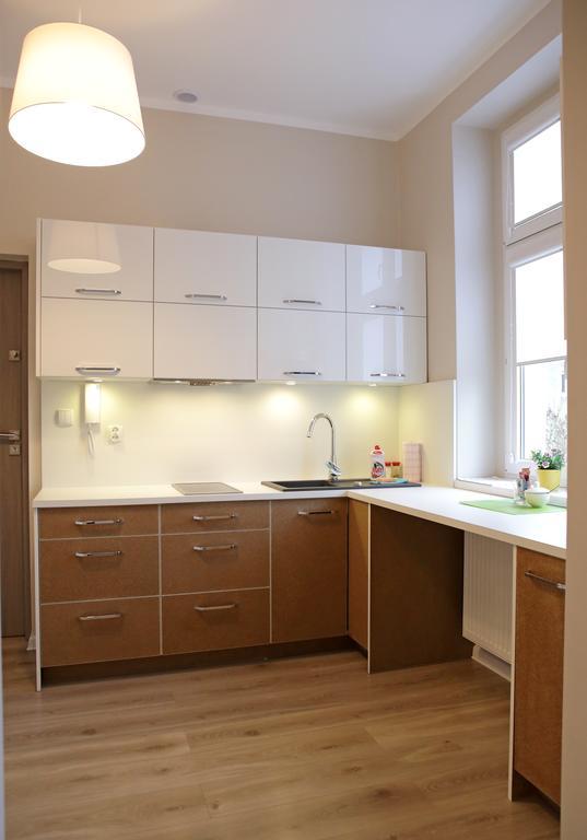 Apartamenty W Sercu Chelmna Chełmno Szoba fotó